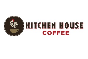Kitchen House Coffee logo behind a cup of coffee